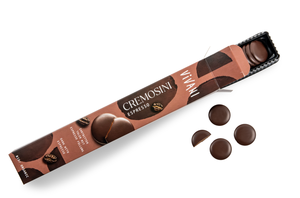 Opened box of ‘Cremosini’ chocolate drops with espresso filling made by VIVANI organic chocolate.